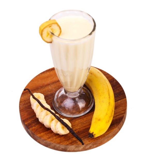 Yummy banana milkshake on a white background