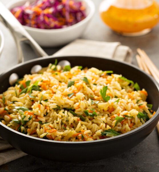 Fried rice with vegetables, steamed broccoli and cole slaw