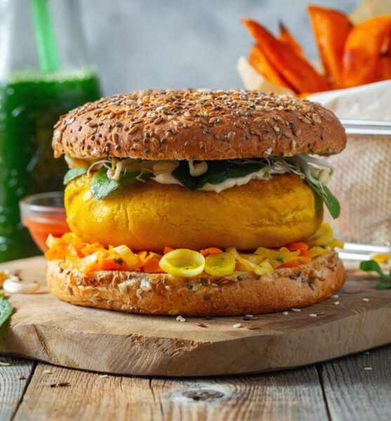 Healthy vegan burger with fresh vegetables.