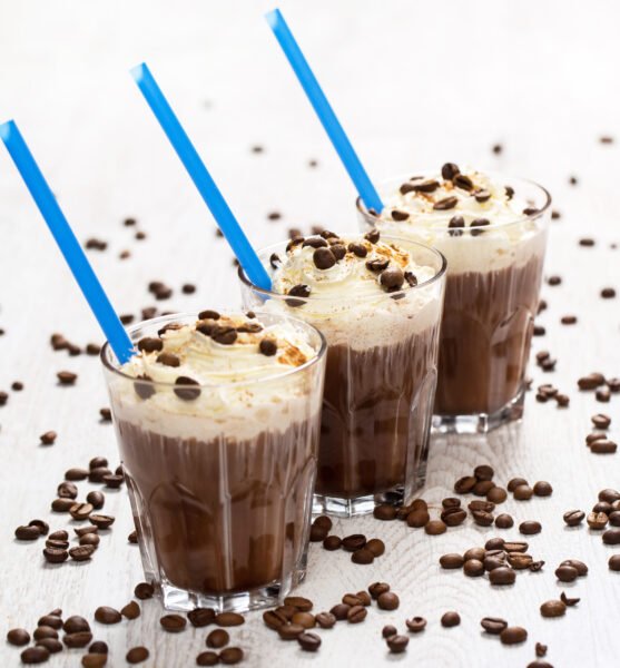 Delicious coffee cocktail with cream foam